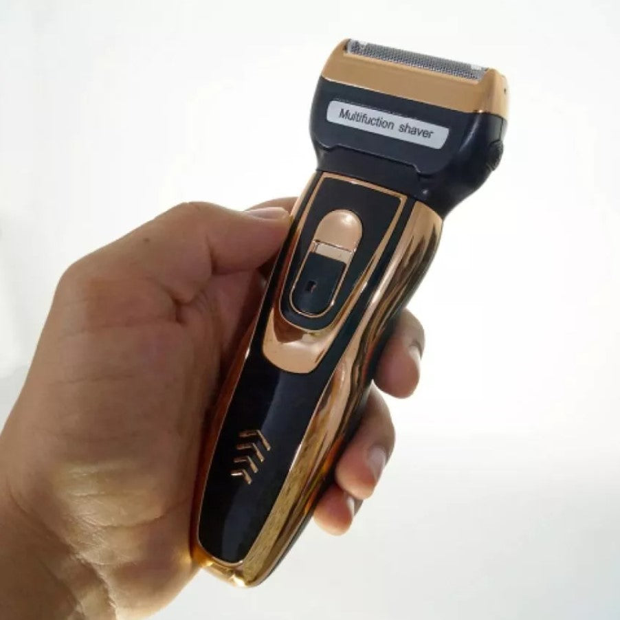 Máquina afeitadora y cortadora de pelo Geemy GM-595 negra y dorada